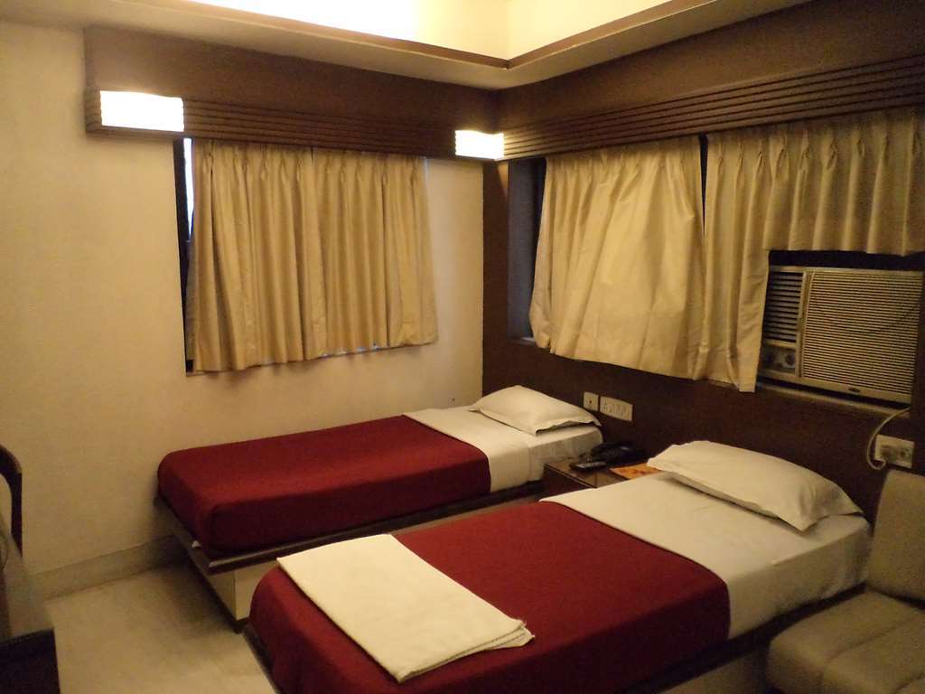 Hotel Aston Колката Стая снимка